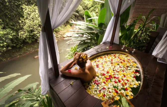 Enjoying a flower bath in Bali